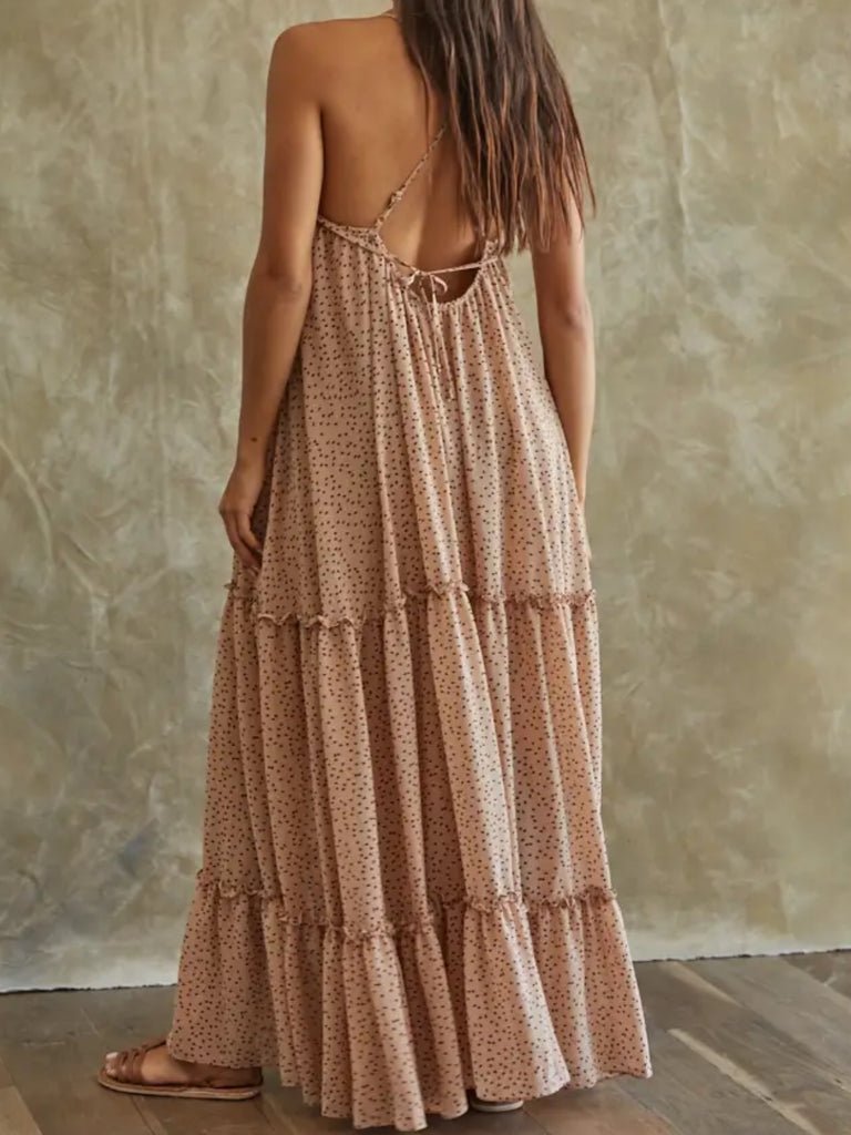 Light Taupe , V -Neck , Lined Ruffle Maxi - Dress with woven chiffon and a dot print throughout and has a Cross Back.