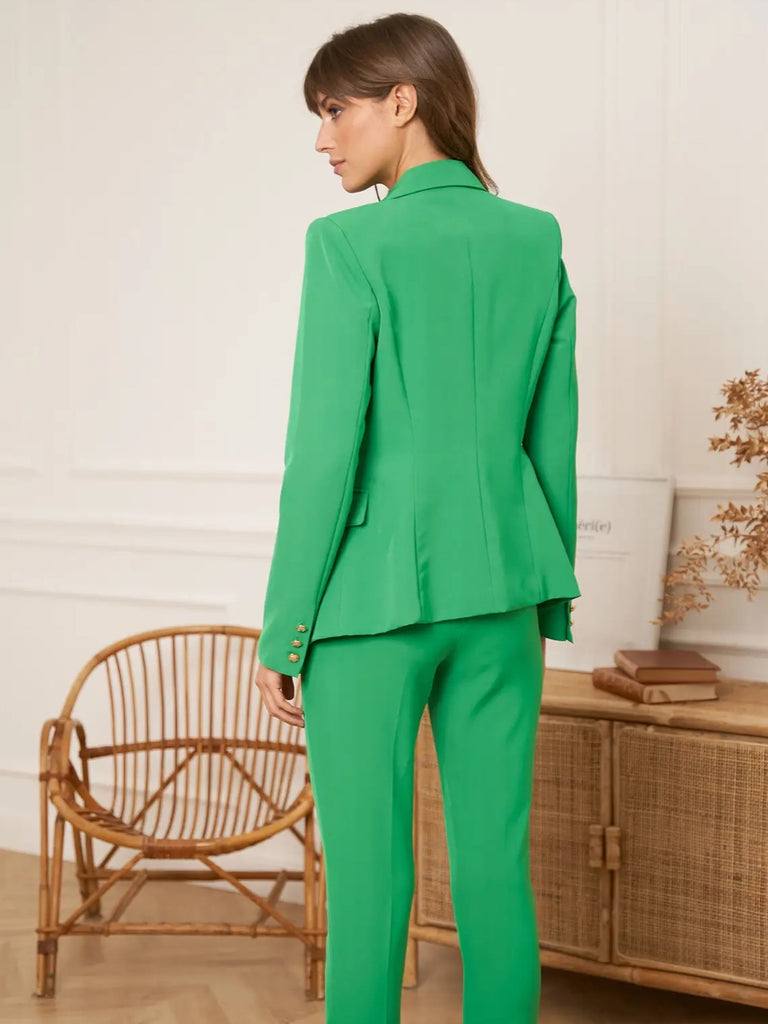 Green Double breasted, fitted Blazer with gold tone buttons, lapel collar, and long sleeves.