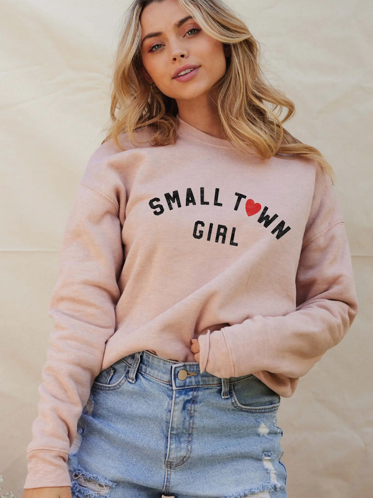 Comfortable relaxed fit , Small Town Girl Pink Sweatshirt with Black font and Red Heart with Ribbed cuffs and waistband.