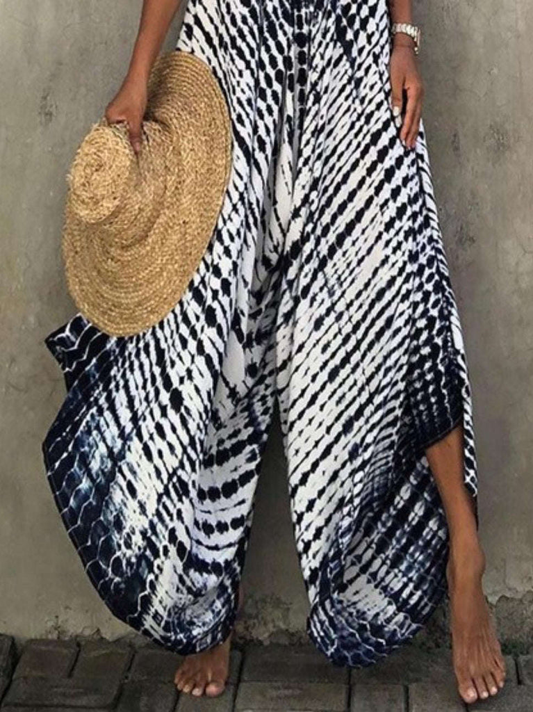 Tie Dye Navy and White Print Wide Leg Jumpsuit in 100% polyester.