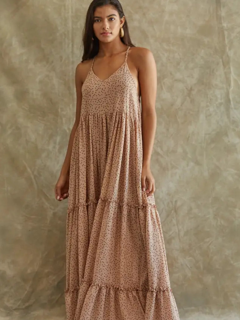 Light Taupe , V -Neck , Lined Ruffle Maxi - Dress with woven chiffon and a dot print throughout and has a Cross Back.