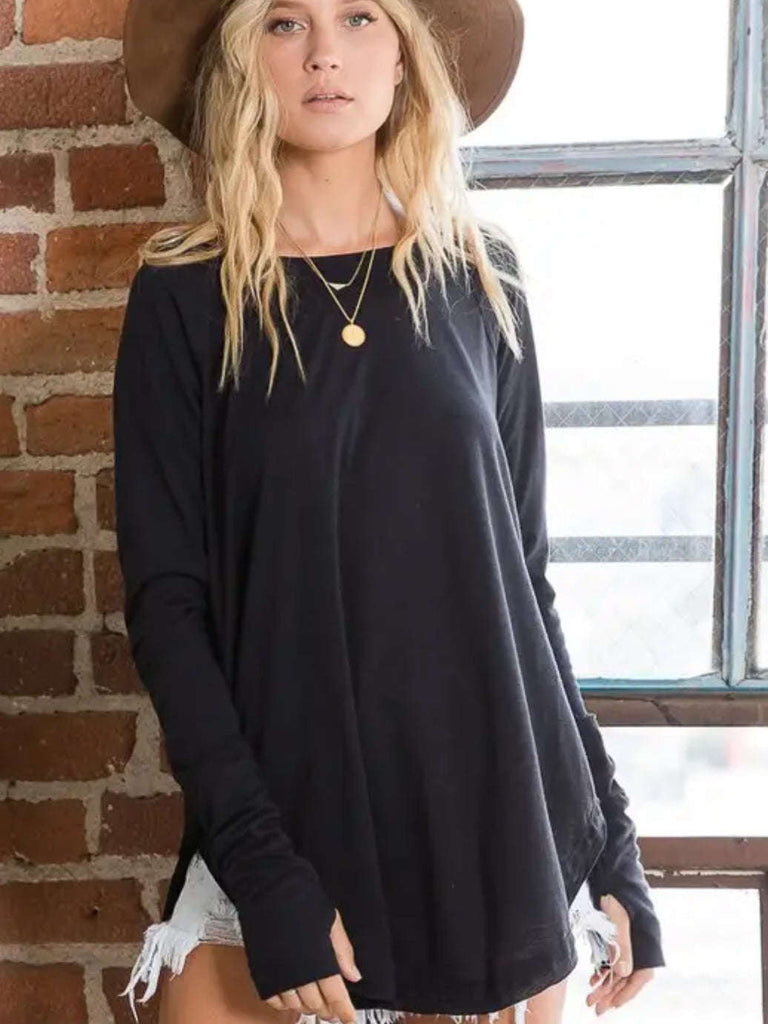 Black Tunic length Crewneck Top has round raw hem with thumb holes and is made from polyester.