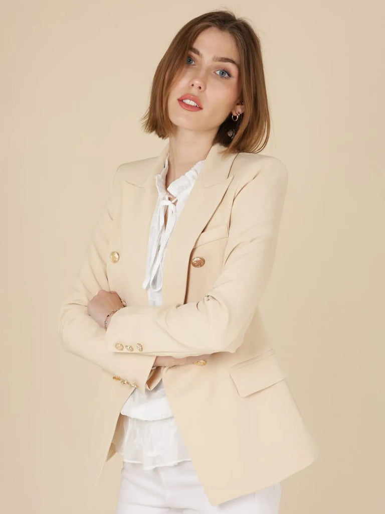 Beige Double breasted, fitted Blazer with gold tone buttons, lapel collar, and long sleeves.